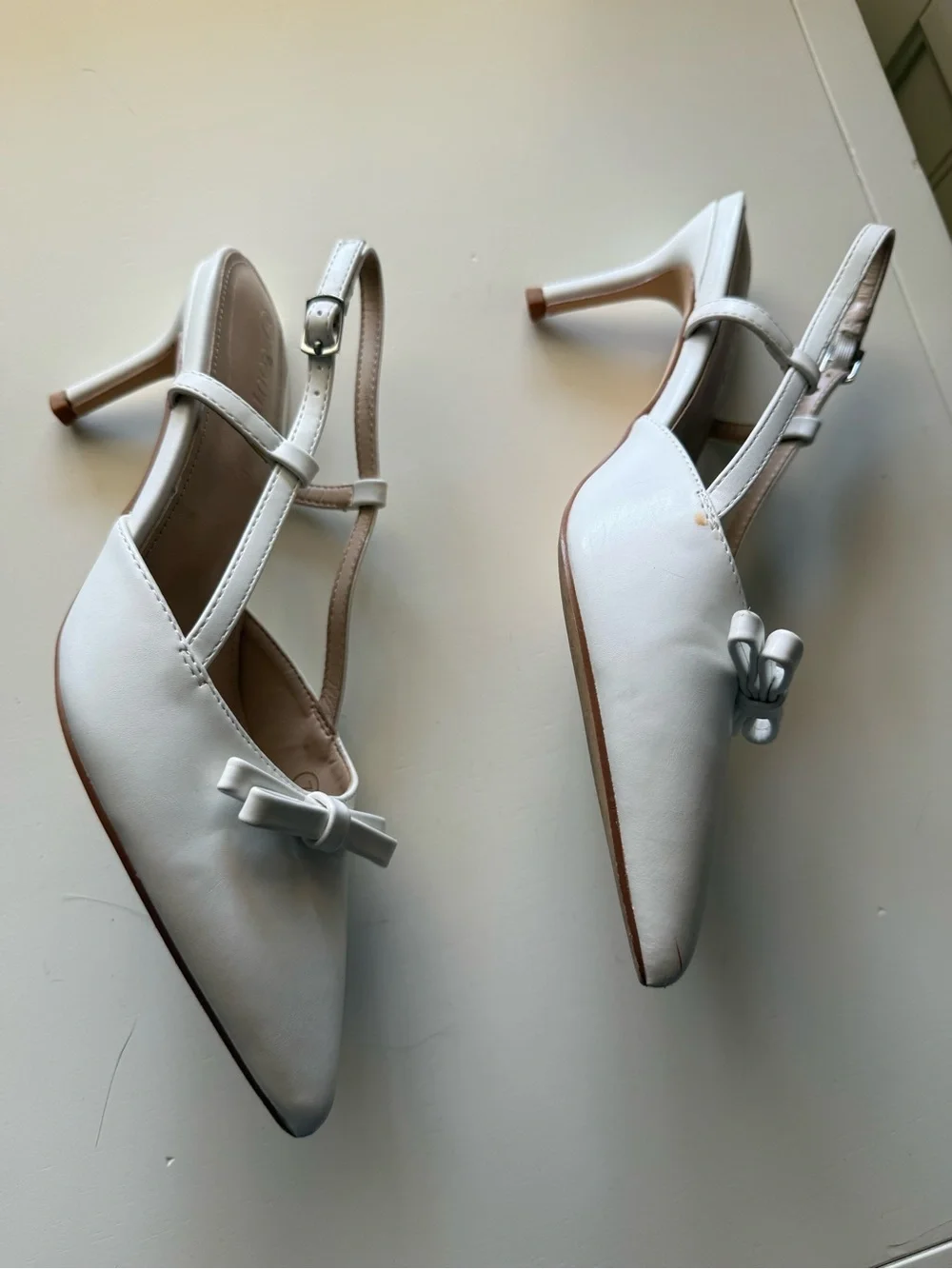 White Pointed Slingback Heels with Bow Accent